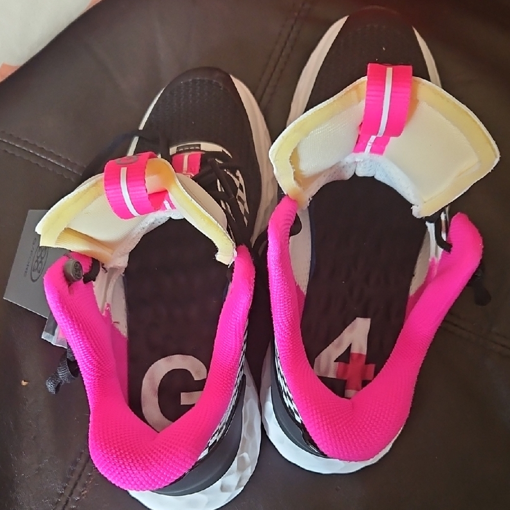 G/FORE Black and Pink Sneakers Sleek Athletic Design